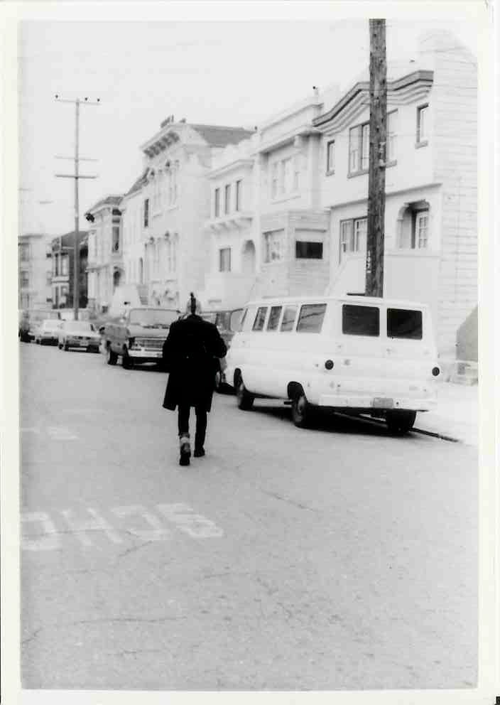 A punk walking away from the camera
